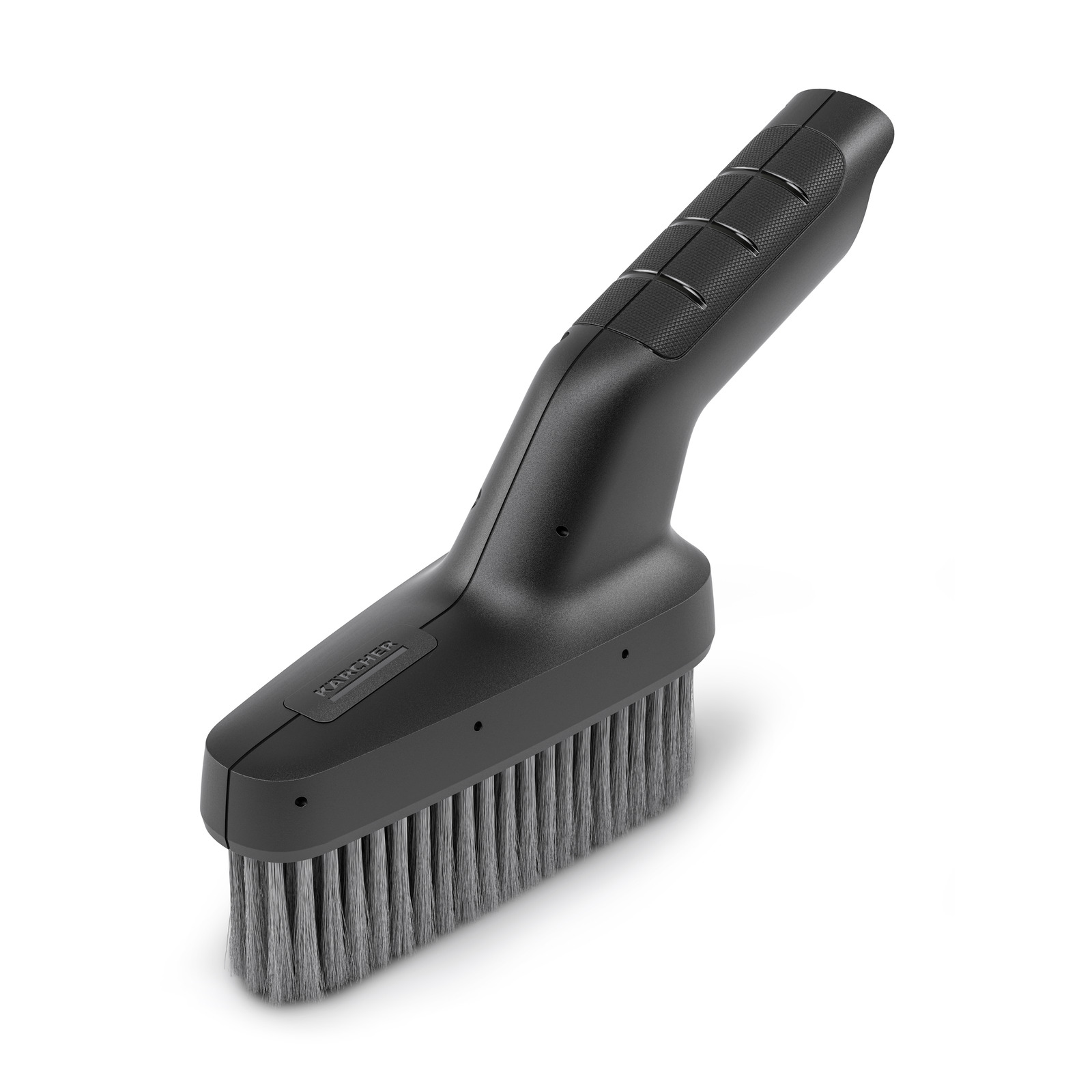 Black Kärcher handheld brush with grey bristles, angled view, isolated on white background. Black Kärcher handheld brush with grey bristles, angled view, isolated on white background.