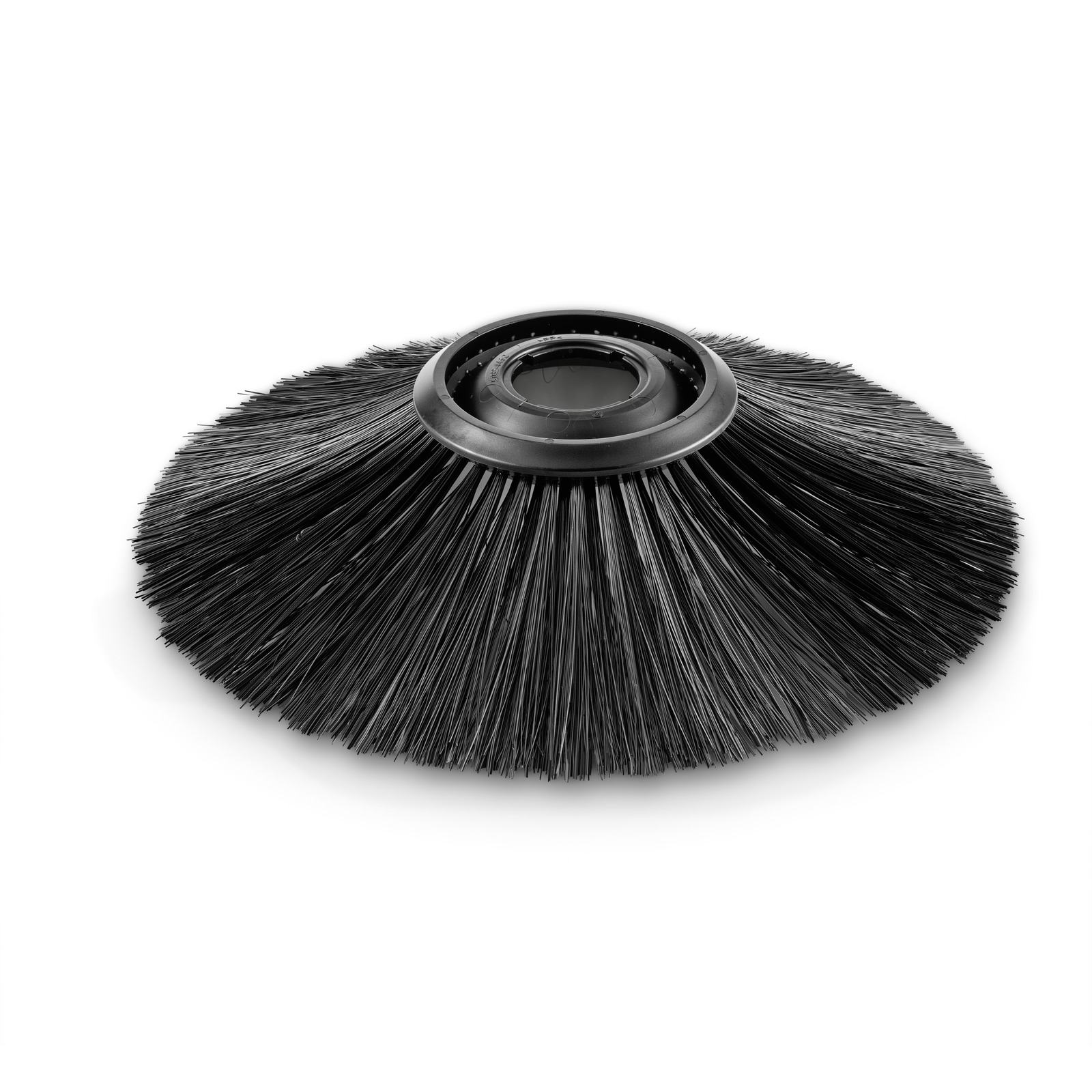Black circular brush attachment with dense bristles, designed for a Kärcher cleaning device, set against a white background. Black circular brush attachment with dense bristles, designed for a Kärcher cleaning device, set against a white background.