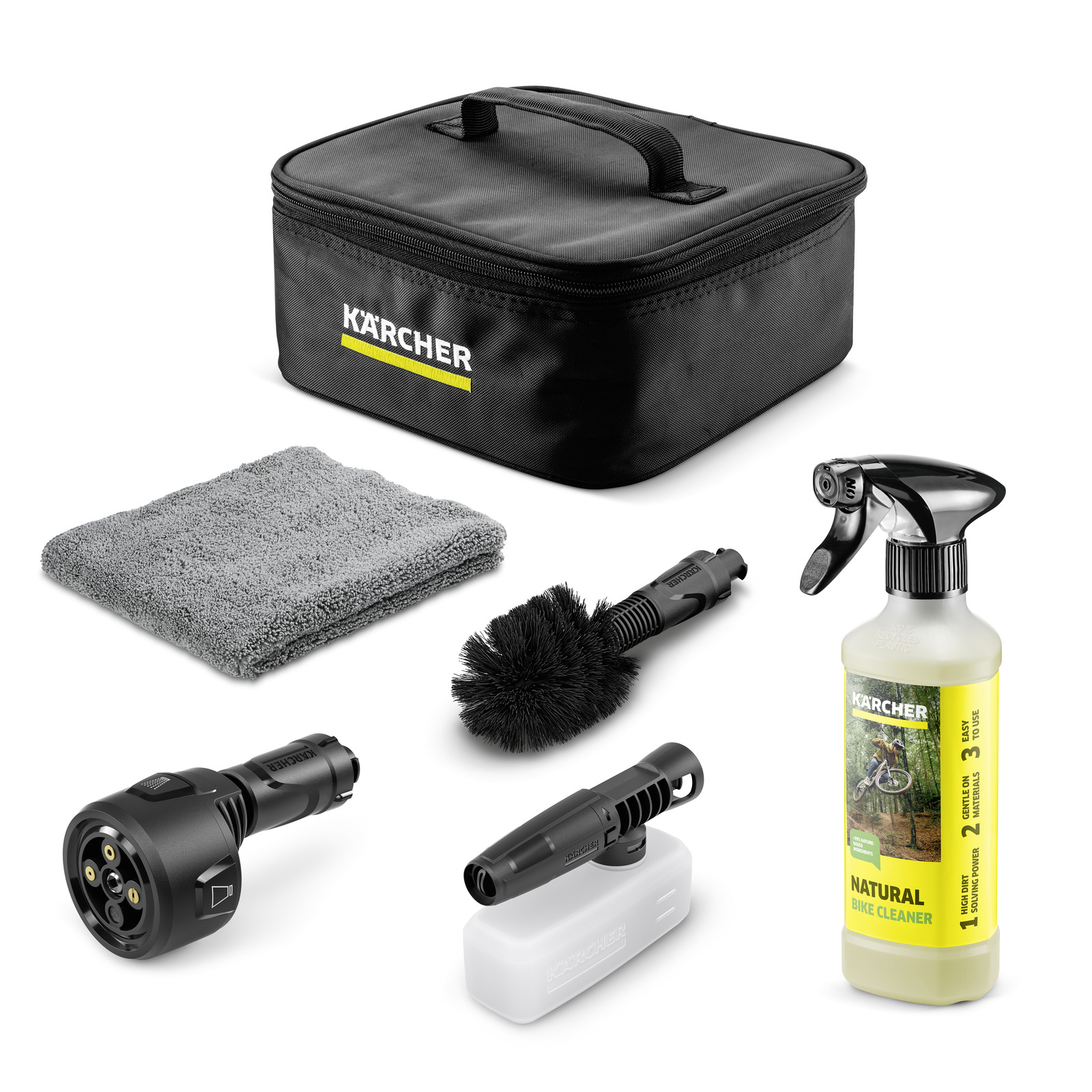 Kärcher cleaning kit with a black bag, grey cloth, brush, spray bottle, and various attachments.