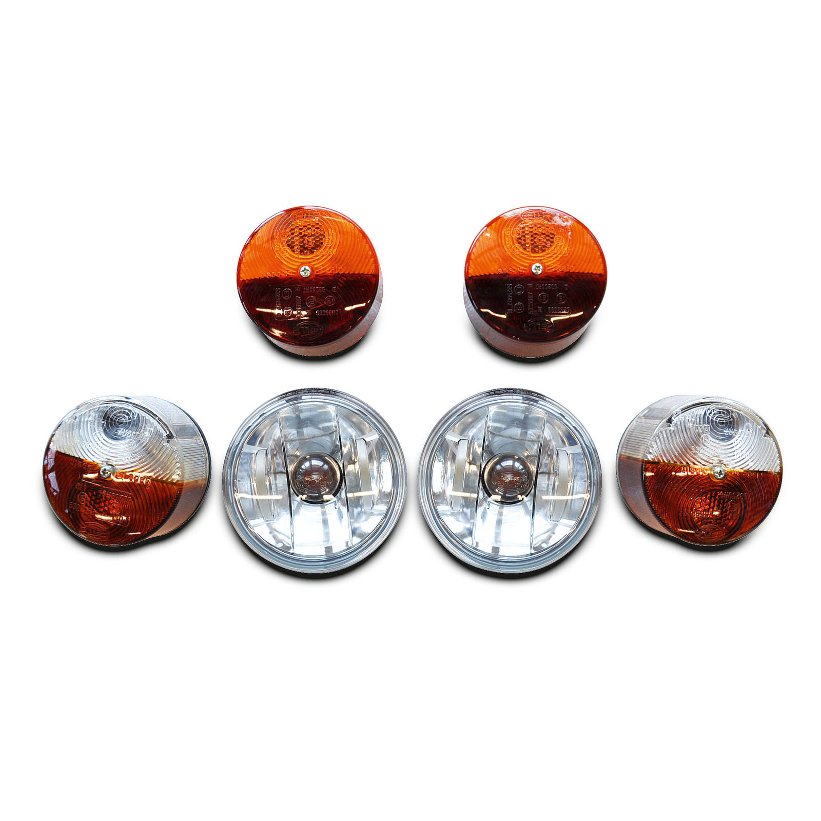 Two round amber lights and two round clear headlights arranged symmetrically on a white background.
