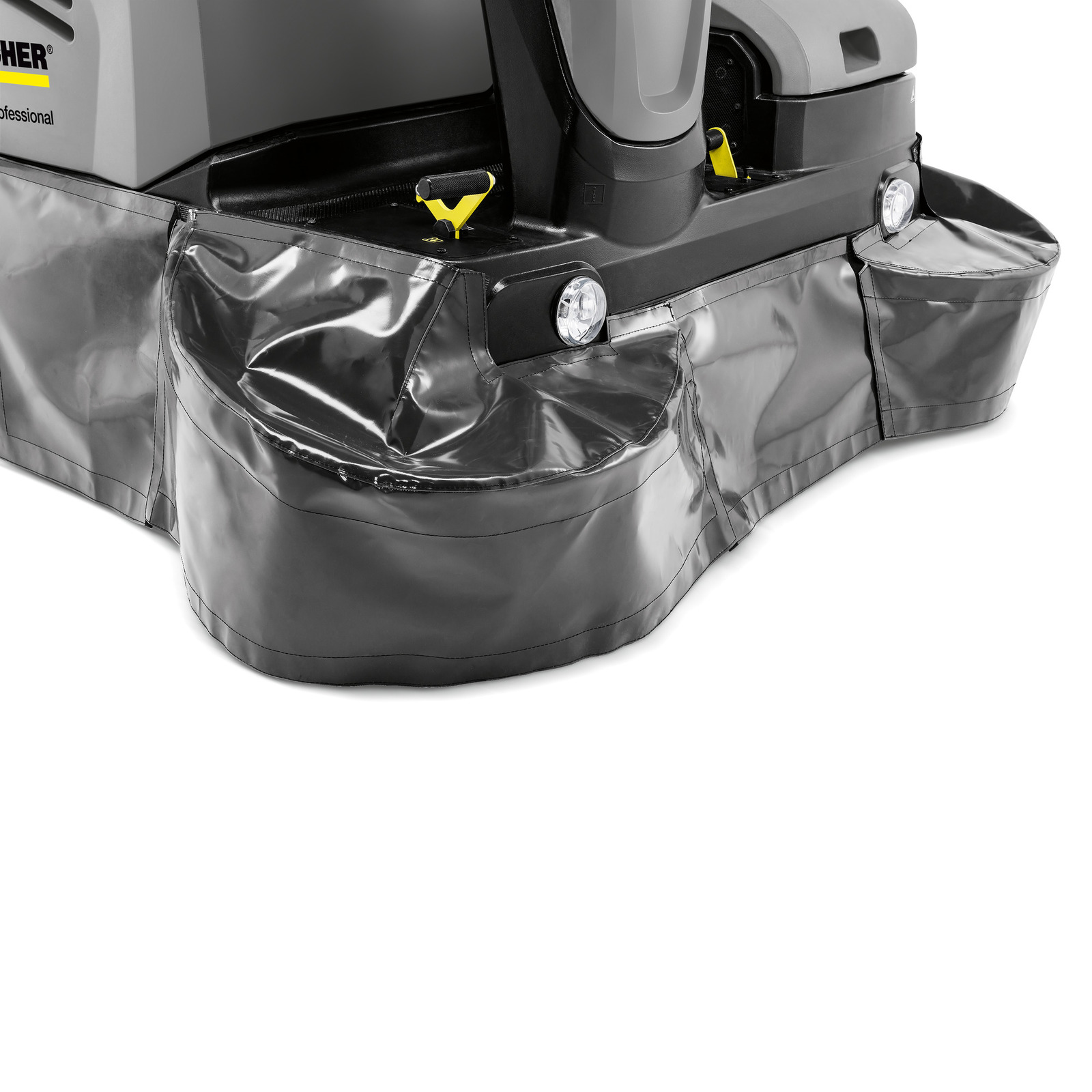 Close-up of a Kärcher floor scrubber with grey protective cover and headlights, showing part of the machine's body.