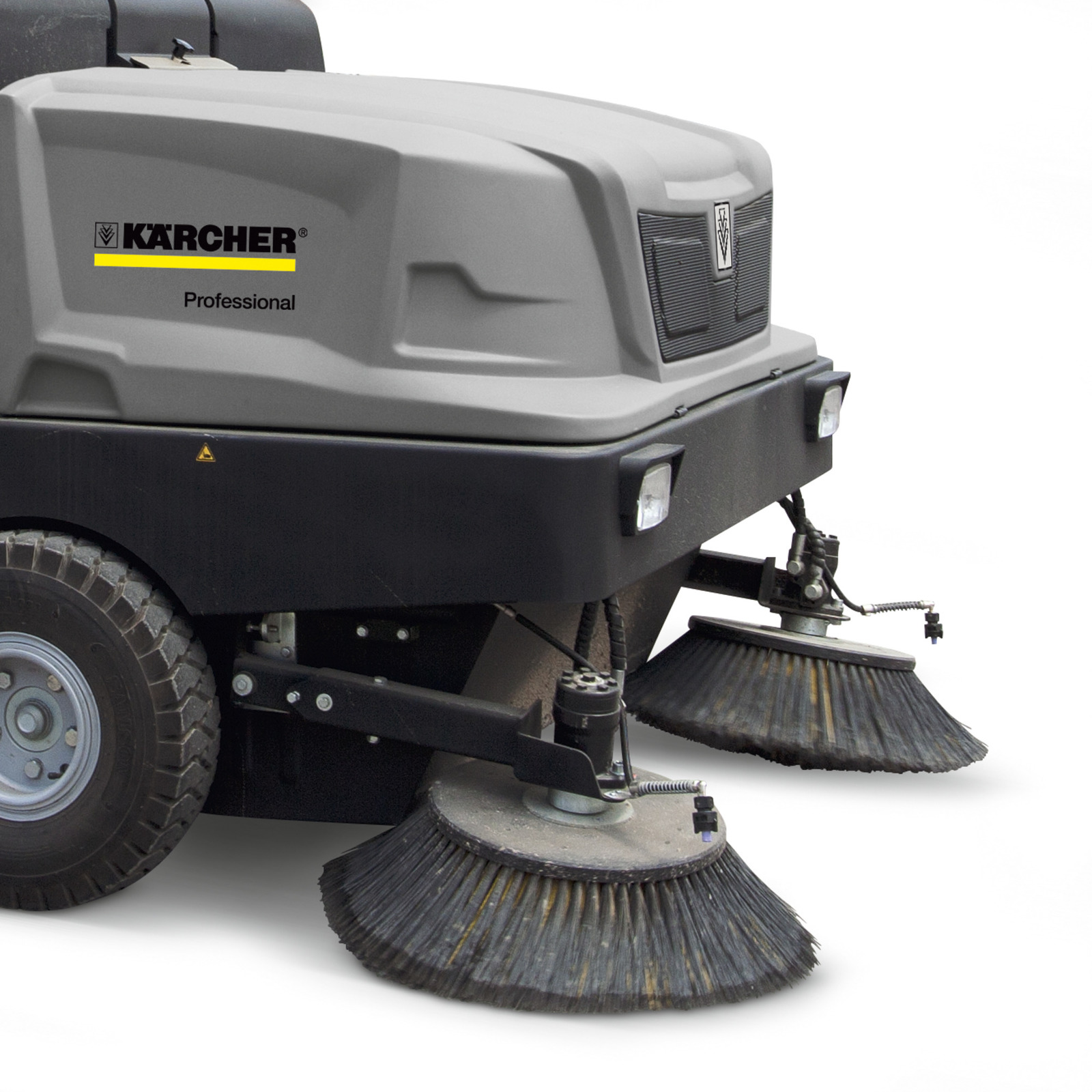 Kärcher professional floor sweeper with dual rotating brushes and large wheels, designed for industrial cleaning. Kärcher professional floor sweeper with dual rotating brushes and large wheels, designed for industrial cleaning.