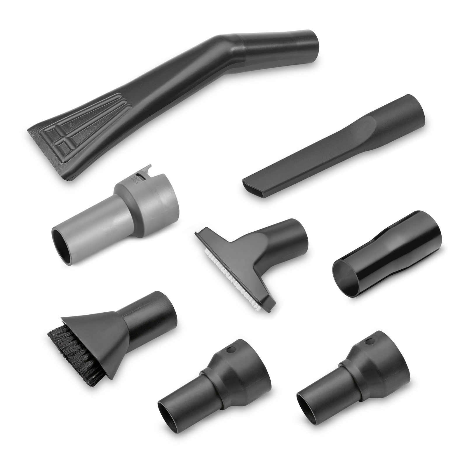 Eight Kärcher vacuum cleaner attachments, including brushes and nozzles, arranged on a white background. Eight Kärcher vacuum cleaner attachments, including brushes and nozzles, arranged on a white background.