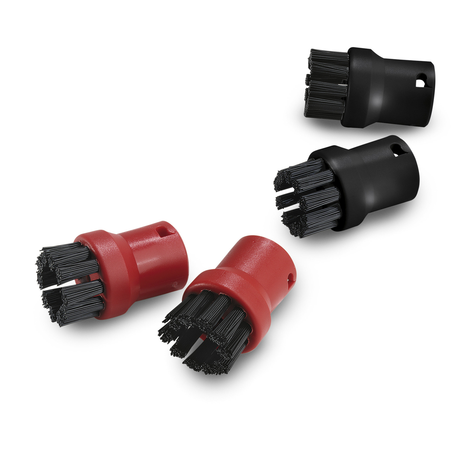 Four Kärcher round brush attachments, two red and two black, with bristles, placed on a white background. Four Kärcher round brush attachments, two red and two black, with bristles, placed on a white background.