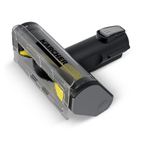 Kärcher vacuum cleaner brush attachment with transparent casing and visible yellow bristles.