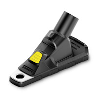 Kärcher vacuum nozzle attachment with a yellow button, angled design, and black finish.