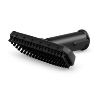 Black Kärcher brush attachment with dense bristles, angled view, isolated on a white background.