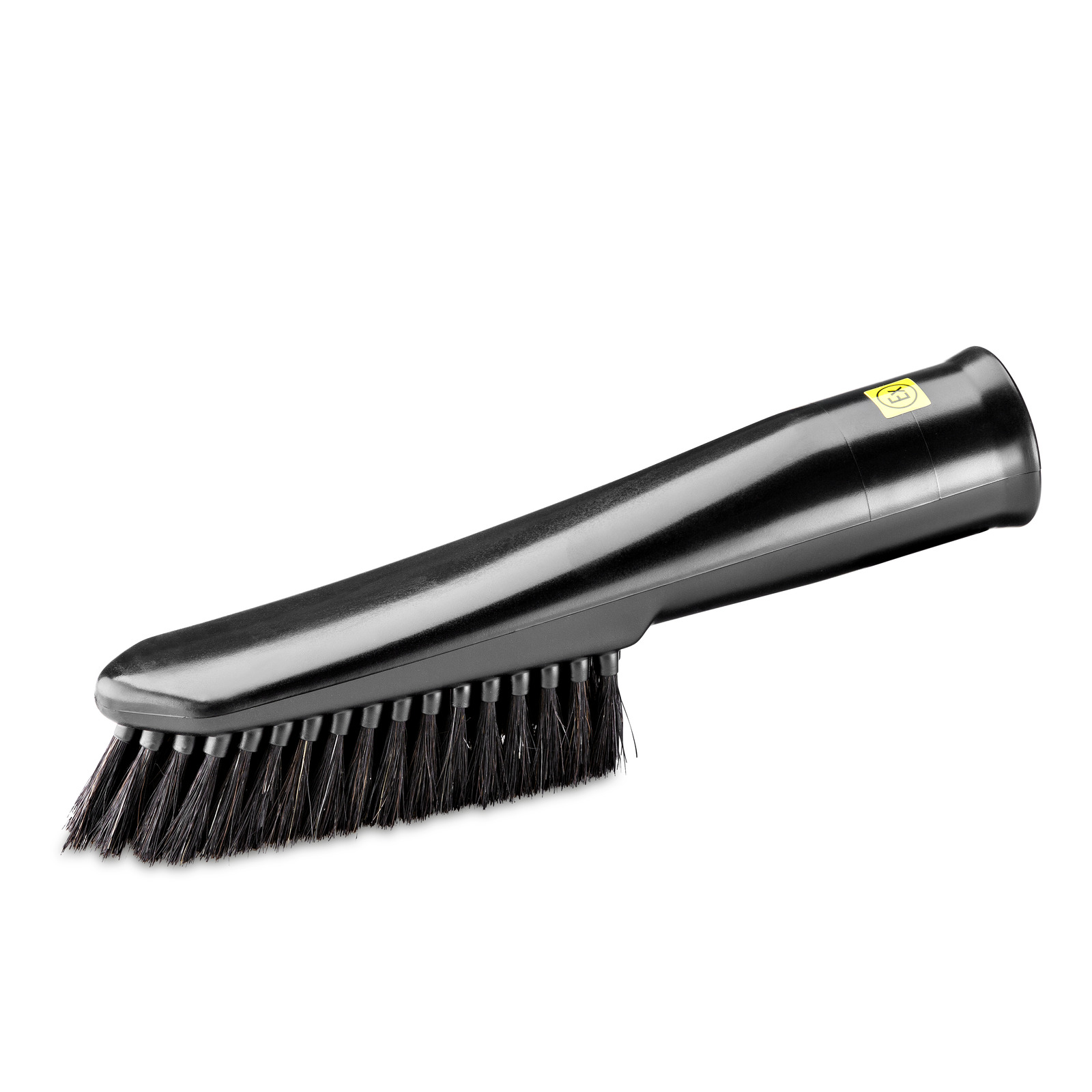 Black Kärcher brush attachment with dense bristles, angled view, isolated on white background.