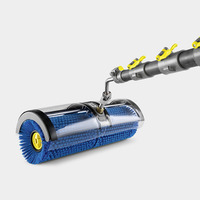 Kärcher roller brush attachment with blue bristles and grey handle, featuring yellow adjustment levers.