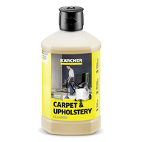 Kärcher Carpet & Upholstery Cleaner bottle with label showing cleaning scene and product features.