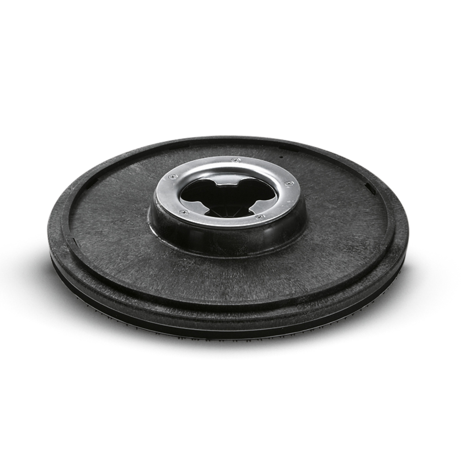 Black Kärcher floor cleaning disc with a central metal hub, viewed from above on a white background. Black Kärcher floor cleaning disc with a central metal hub, viewed from above on a white background.