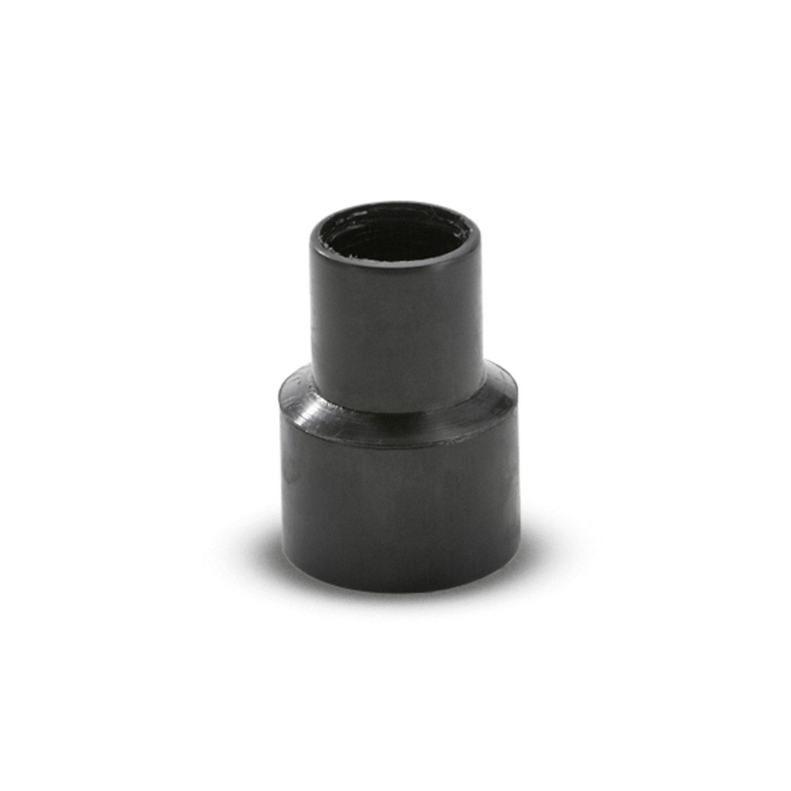 Black plastic hose connector with a cylindrical shape, shown on a white background. Black plastic hose connector with a cylindrical shape, shown on a white background.