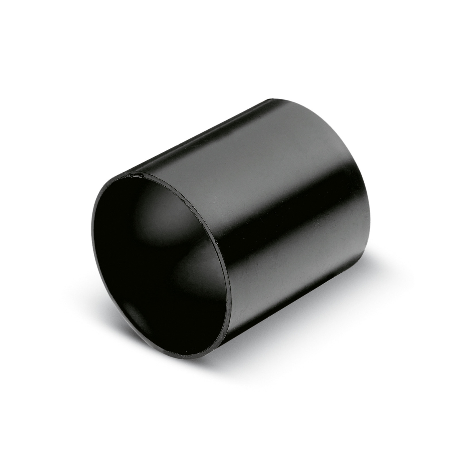 Black cylindrical plastic pipe connector on a white background. Black cylindrical plastic pipe connector on a white background.