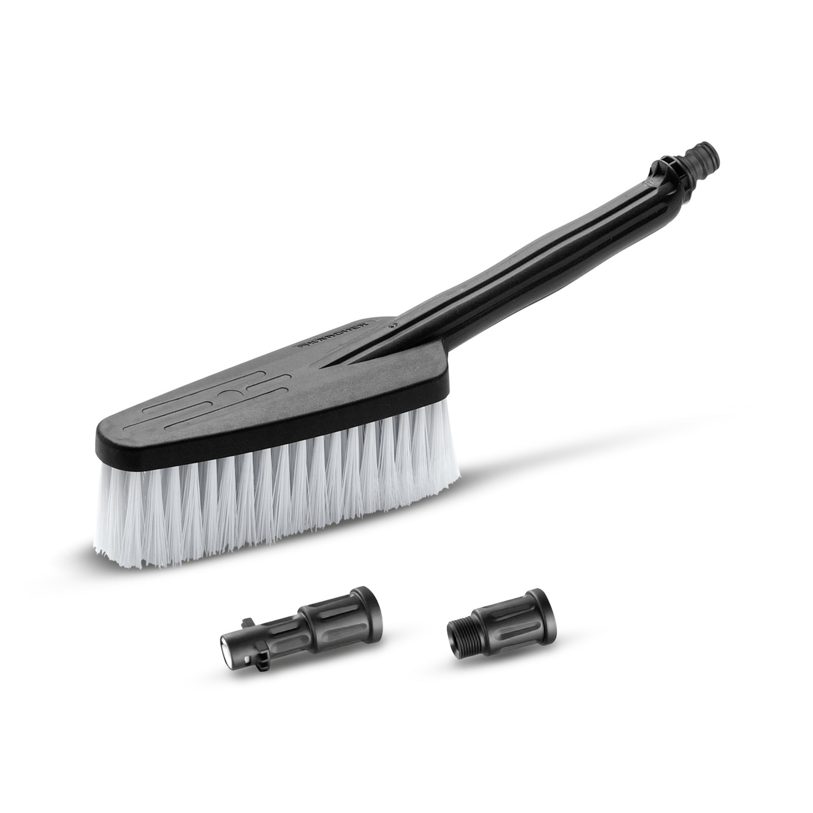 Kärcher wash brush with white bristles and black handle, accompanied by two black nozzle attachments. Kärcher wash brush with white bristles and black handle, accompanied by two black nozzle attachments.