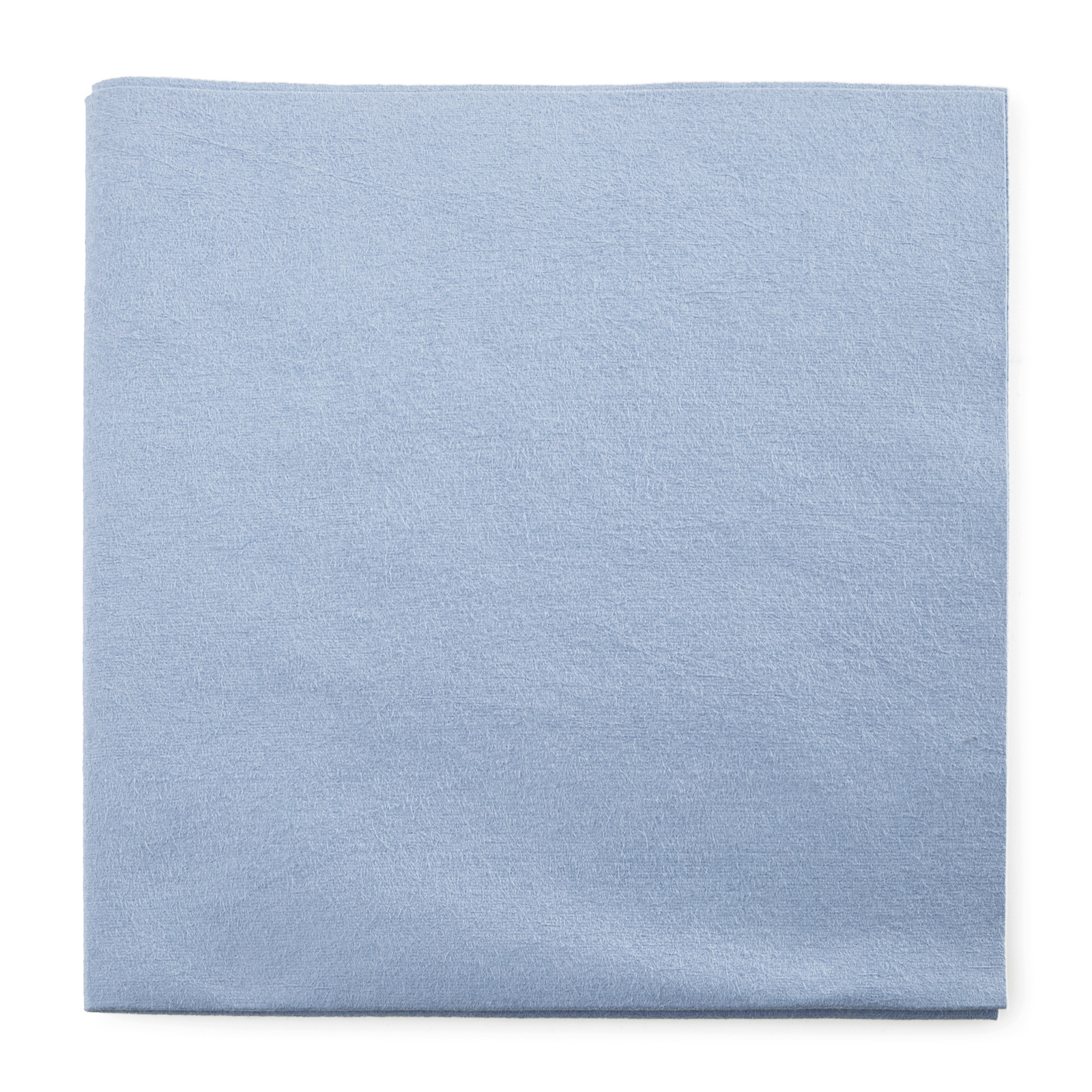 Folded light blue cloth on a white background. Folded light blue cloth on a white background.