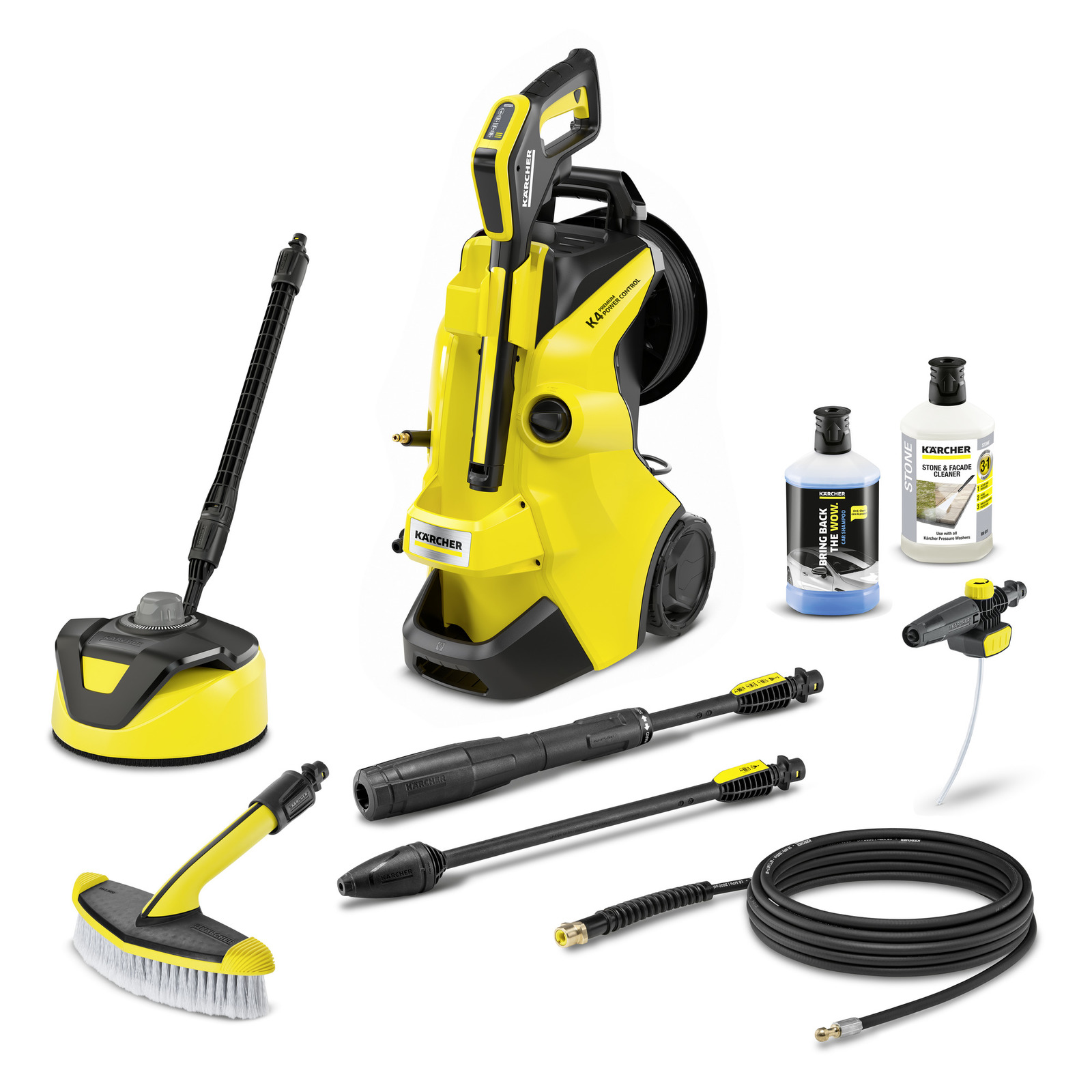 Kärcher high-pressure cleaner with accessories including brushes, nozzles, hoses, and cleaning solutions, all in yellow and black.